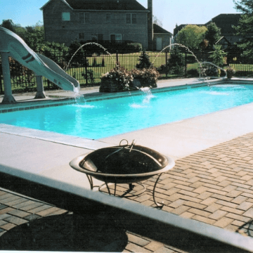 Inground pool with firepit